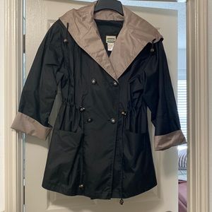 Hooded water resistant rain jacket.